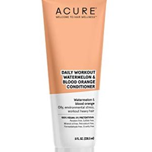 Orange hair conditioner for nourished and vibrant hair.