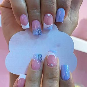 Blue tips on acrylic nails.