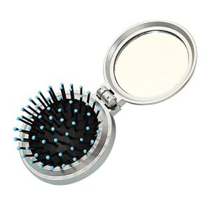 Baby?s first hair brush experience.