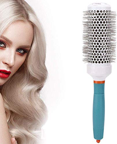 Aluminum hair brush for styling and detangling hair.