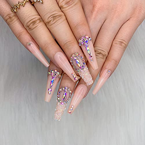 Sparkling acrylic nails with dazzling embellishments. - Image 2