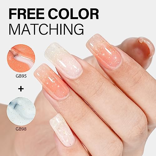 Sparkly orange nail polish for a dazzling manicure. - Image 4