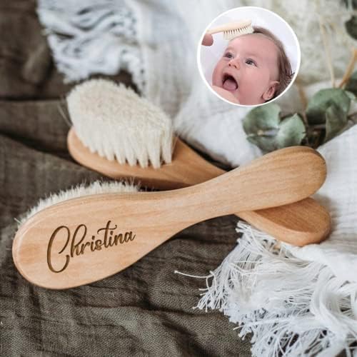Baby wooden hair brush for gentle grooming.