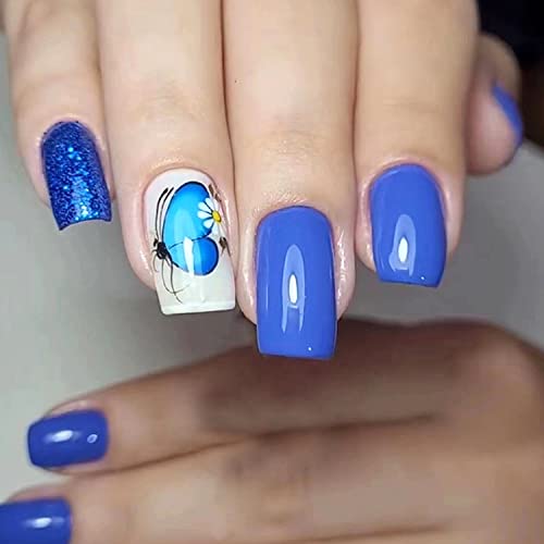 Blue butterfly design on acrylic nails.