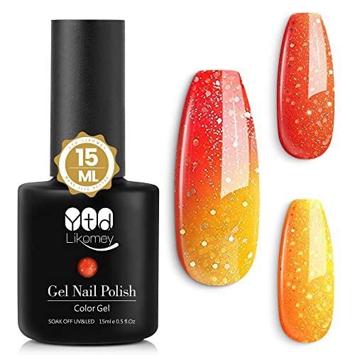 Bright orange yellow nail polish for a vibrant manicure.