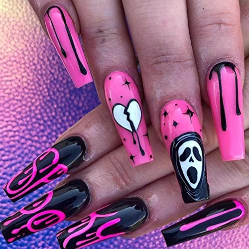 Halloween-themed coffin-shaped acrylic nails.