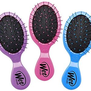 Portable hair brush that fits in backpack.