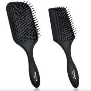 Black paddle brush for hair styling.