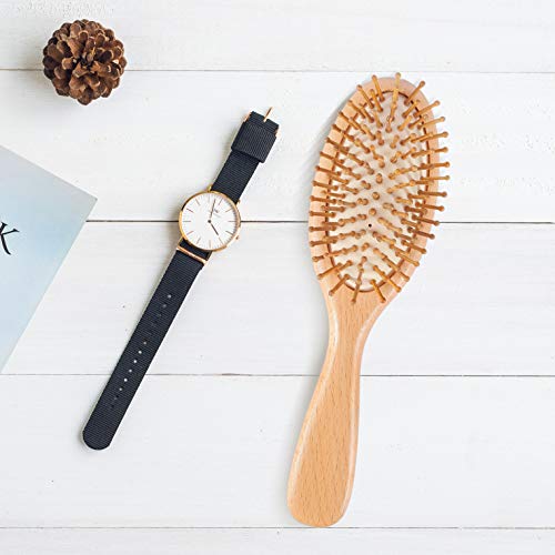 Natural wood hair brush for eco-friendly grooming. - Image 6