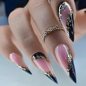 Acrylic stiletto nails for a fierce look.