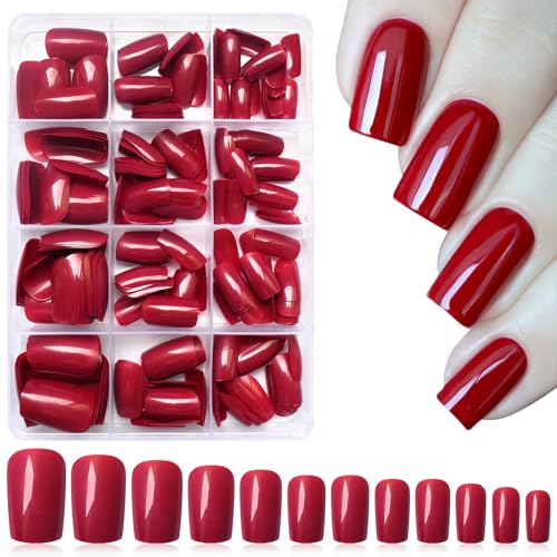 Bold red acrylic nails for a striking look.