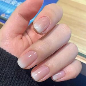 Gradient effect nail polish for trendy, stylish nails.
