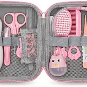 Pink baby hair brush for gentle grooming.