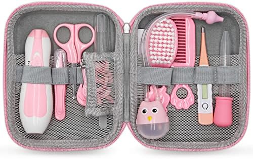Pink baby hair brush for gentle grooming.