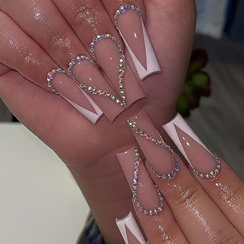 Sparkly coffin-shaped acrylic nails.