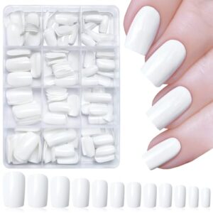 White acrylic nails complement dark skin beautifully.