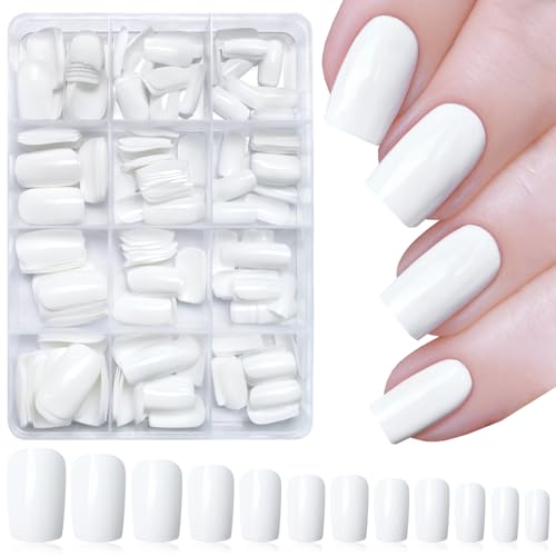 White acrylic nails complement dark skin beautifully.