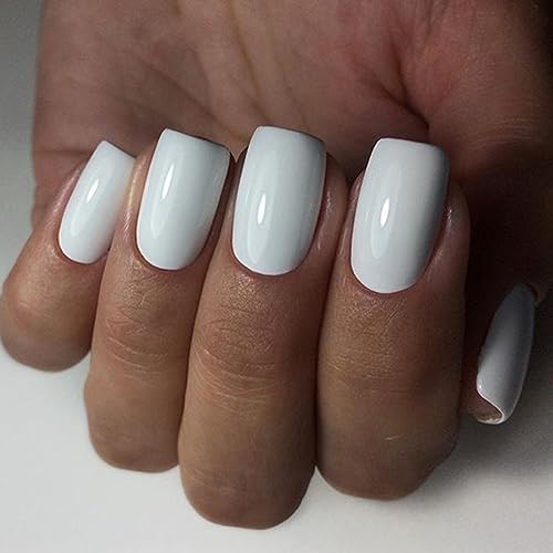 White acrylic nails complement dark skin beautifully. - Image 2