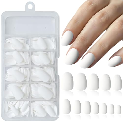 White round acrylic nails.
