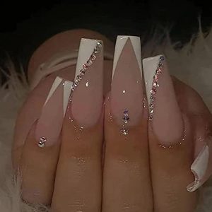 Long French tip acrylic nails.