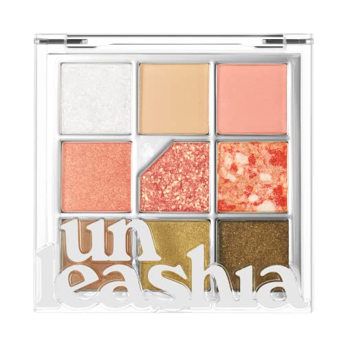 Orange eyeshadow look with burnt tones.
