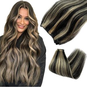 Human hair extension sewn onto natural hair.