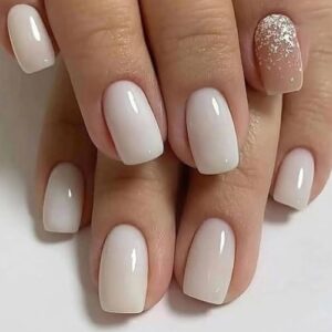 Milky white short acrylic nails.