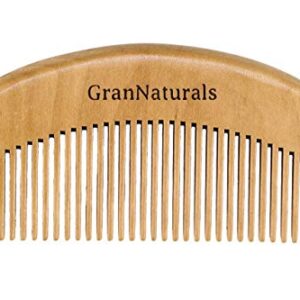 Natural hair comb brush for easy detangling and styling.