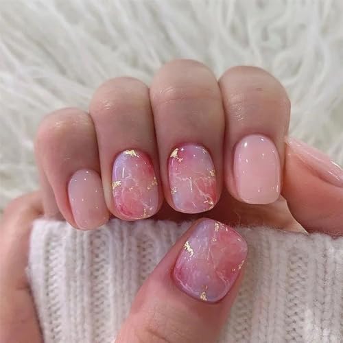 Pink marble acrylic nails.