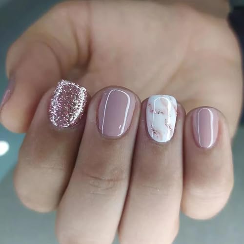Pink marble design on acrylic nails.