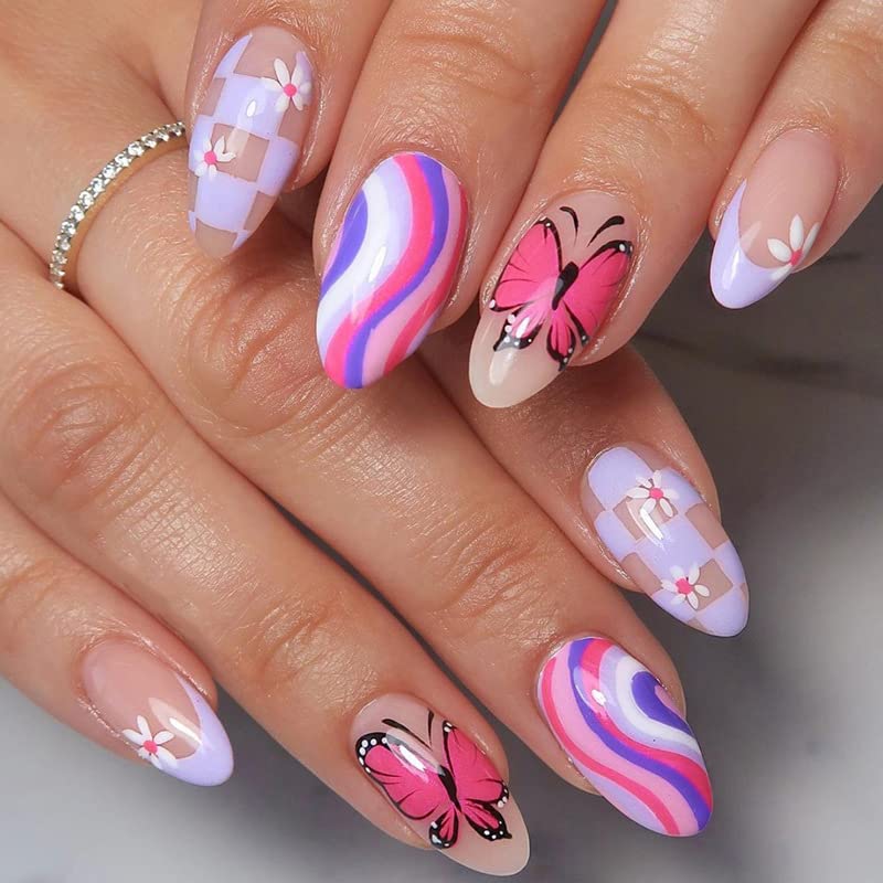 Purple butterfly design on short acrylic nails.