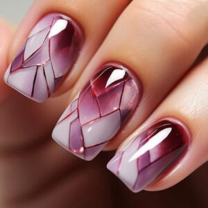 Purple marble design on acrylic nails.
