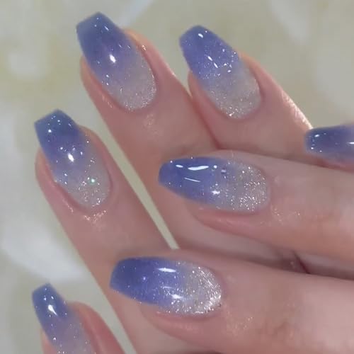Sparkly acrylic nails with gradient effect.