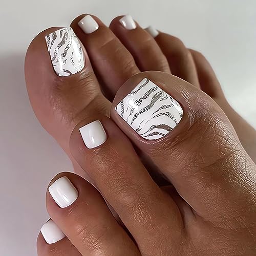 White acrylic nails and toes for a polished look.