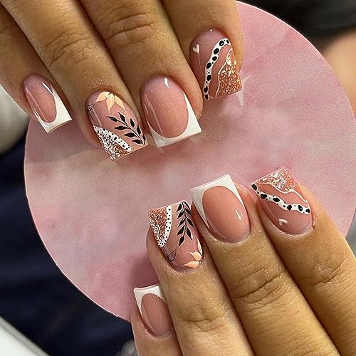 White and gold short acrylic nails.