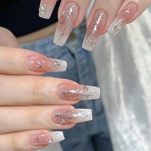 White coffin-shaped acrylic nails.