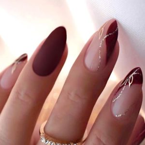 Acrylic nails with line design.