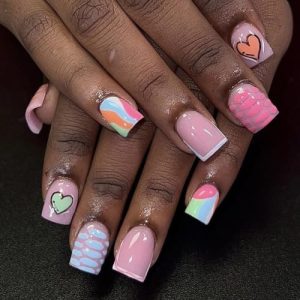 Colorful short acrylic nails.