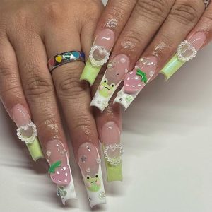 Juicy strawberry acrylic nails for a sweet look.