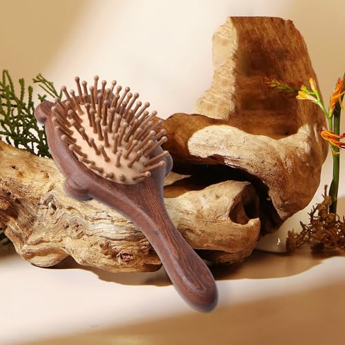 Rubber handle hair brush for easy styling and detangling. - Image 4