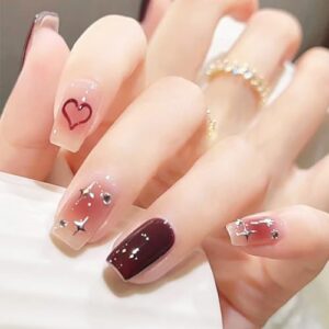 Short coffin-shaped acrylic nails.