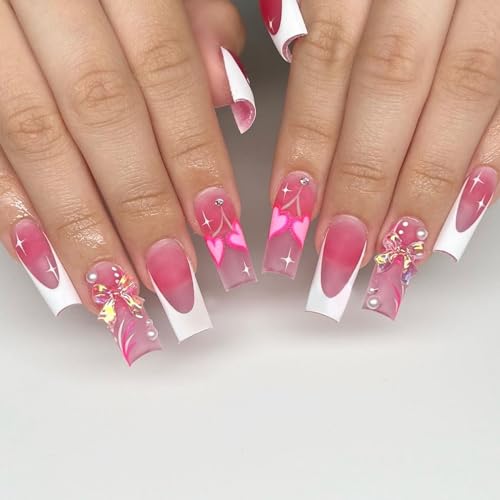 White and pink acrylic nails.