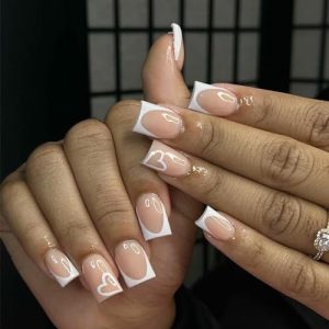 Valentines Press on Nails Medium Square French Tip Fake Nails Nude Full Cover White Hollow Out Heart False Nails with Designs Glossy Glue on Nails Acrylic Artificial Nails for Women Girls 24Pcs