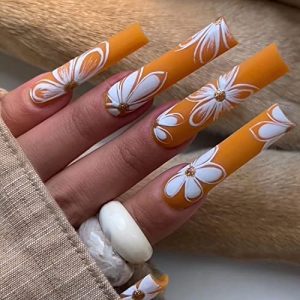 Long Press on Nails Coffin Fake Nails with Nail Glue Full Cover Orange False Nails with Flower Designs Acrylic Artificial Nails Stick on Nails for Women Nail Decorations 24Pcs
