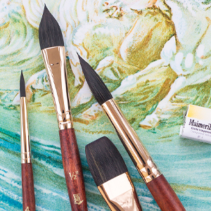 Four paintbrushes askew on a multicolor background