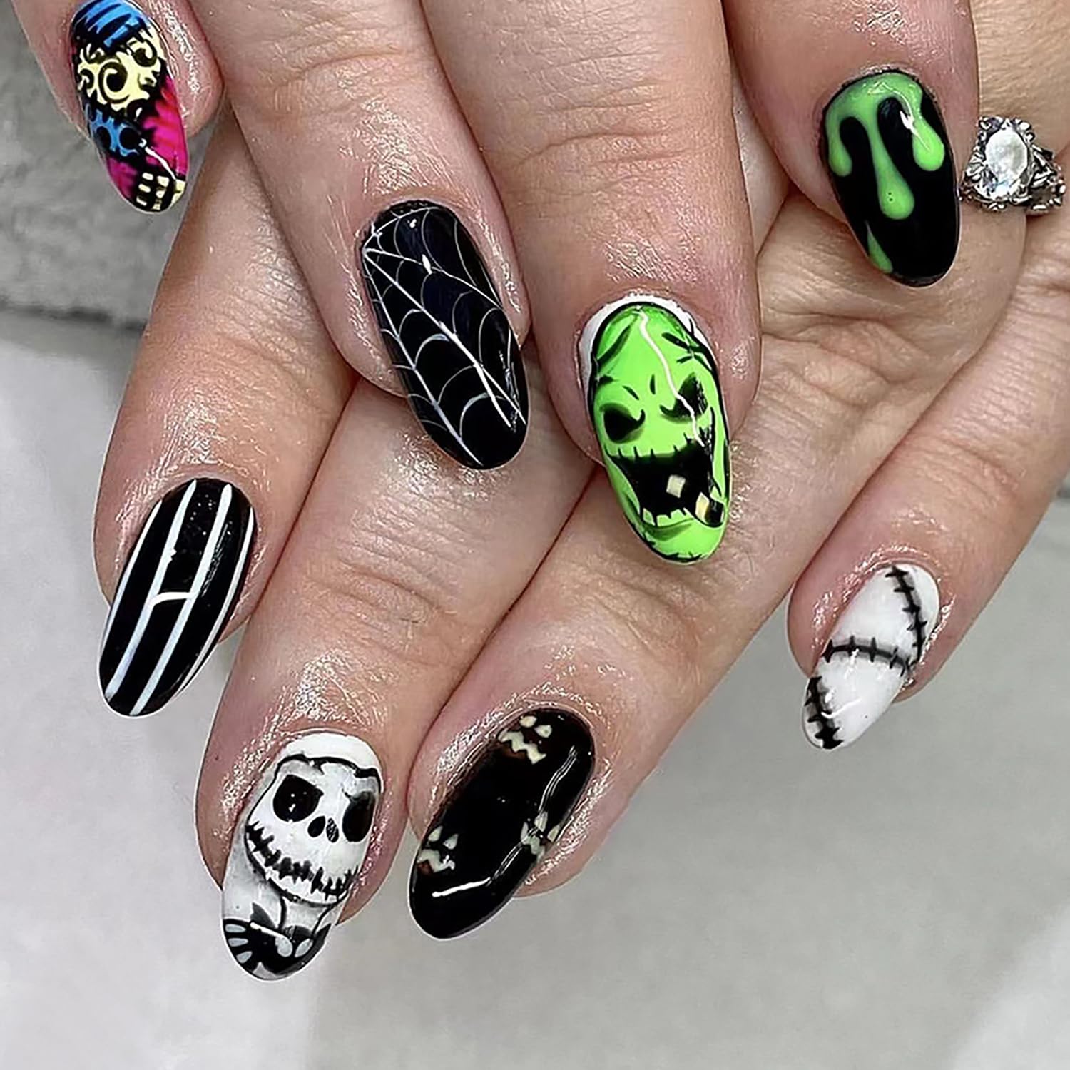 24 Pcs Halloween Press on Nails Medium Almond Fake Nightmare Before Christmas Acrylic With Spider Web and Green Monster Face Designs Glossy False Stick on for Women Girls