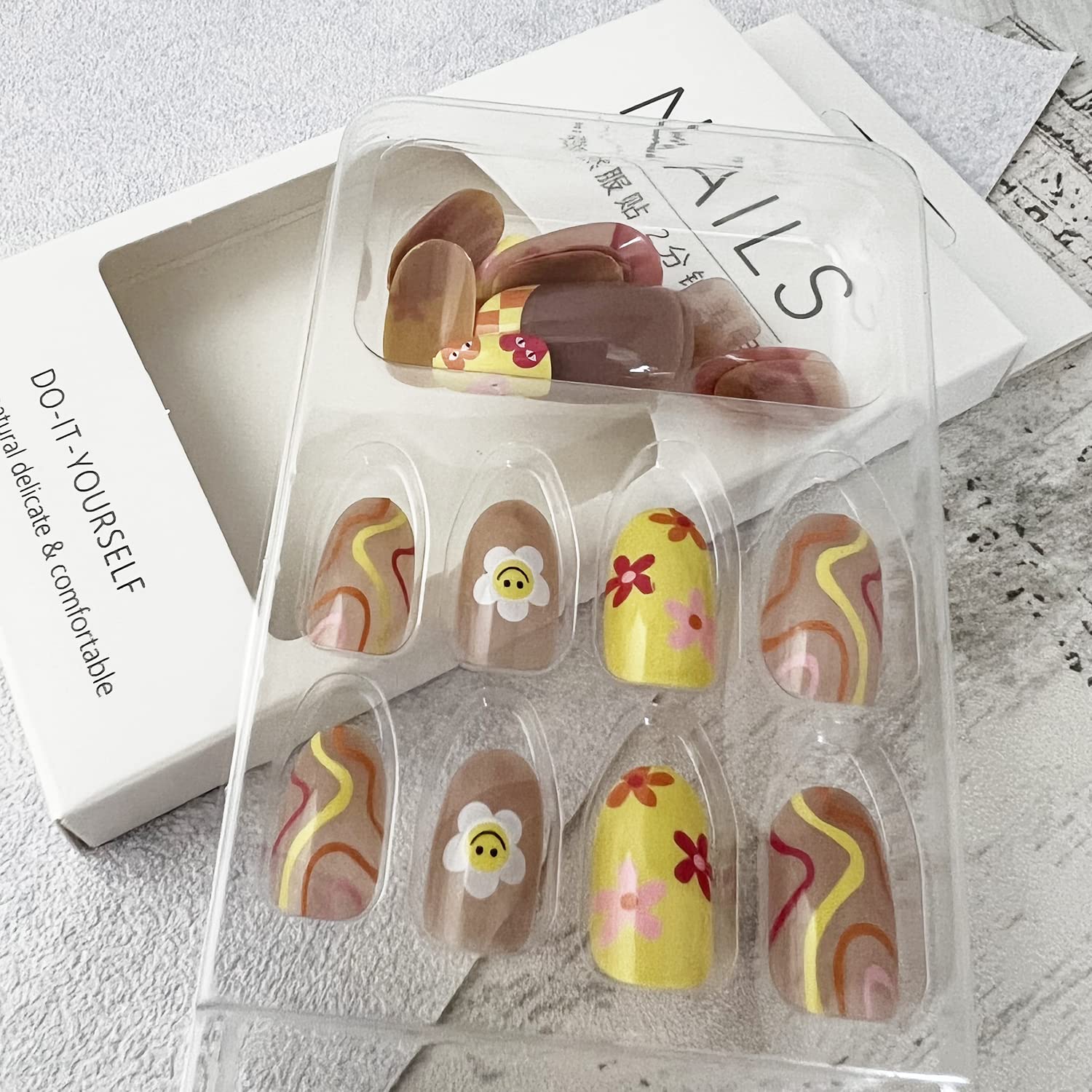 24 Piece Short Almond French Sun Flower Press On Nails Set with Glue Stickers for Women and Girls - Image 4