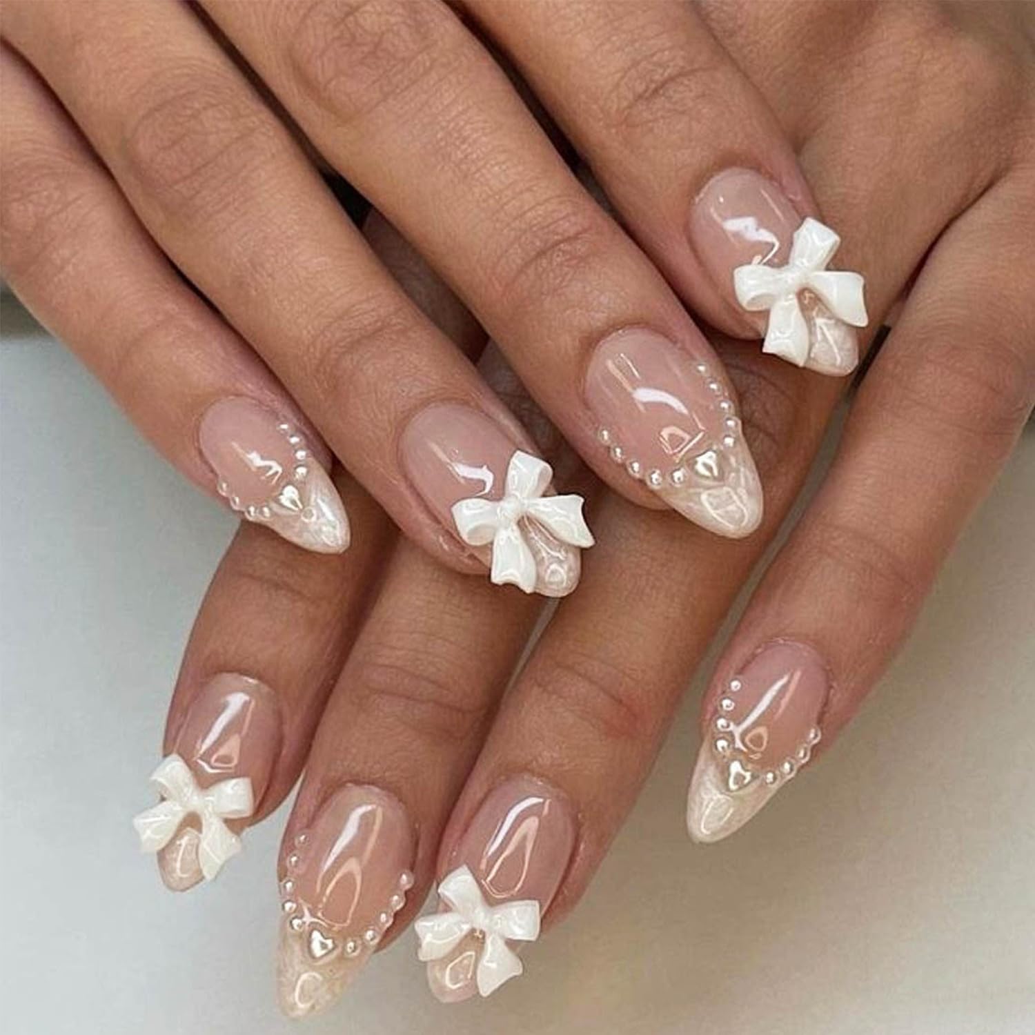 24Pcs Almond Press on Nails French Tips Short Fake Nails with Cute Bow Charms Design French Press on False Nails Nude Pink Acrylic Nails Almond Shaped Artificial Nails for Women Girls Manicure Tip