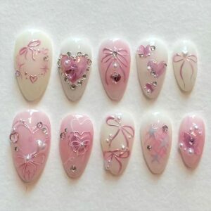 24Pcs Pink Bow Press on Nails Medium Almond Fake Nails with Silver Heart Rhinestones Design Glitter False Nails White Full Cover Artificial Glue on Nails Handmade Stick on Nails for Women Acrylic Nail