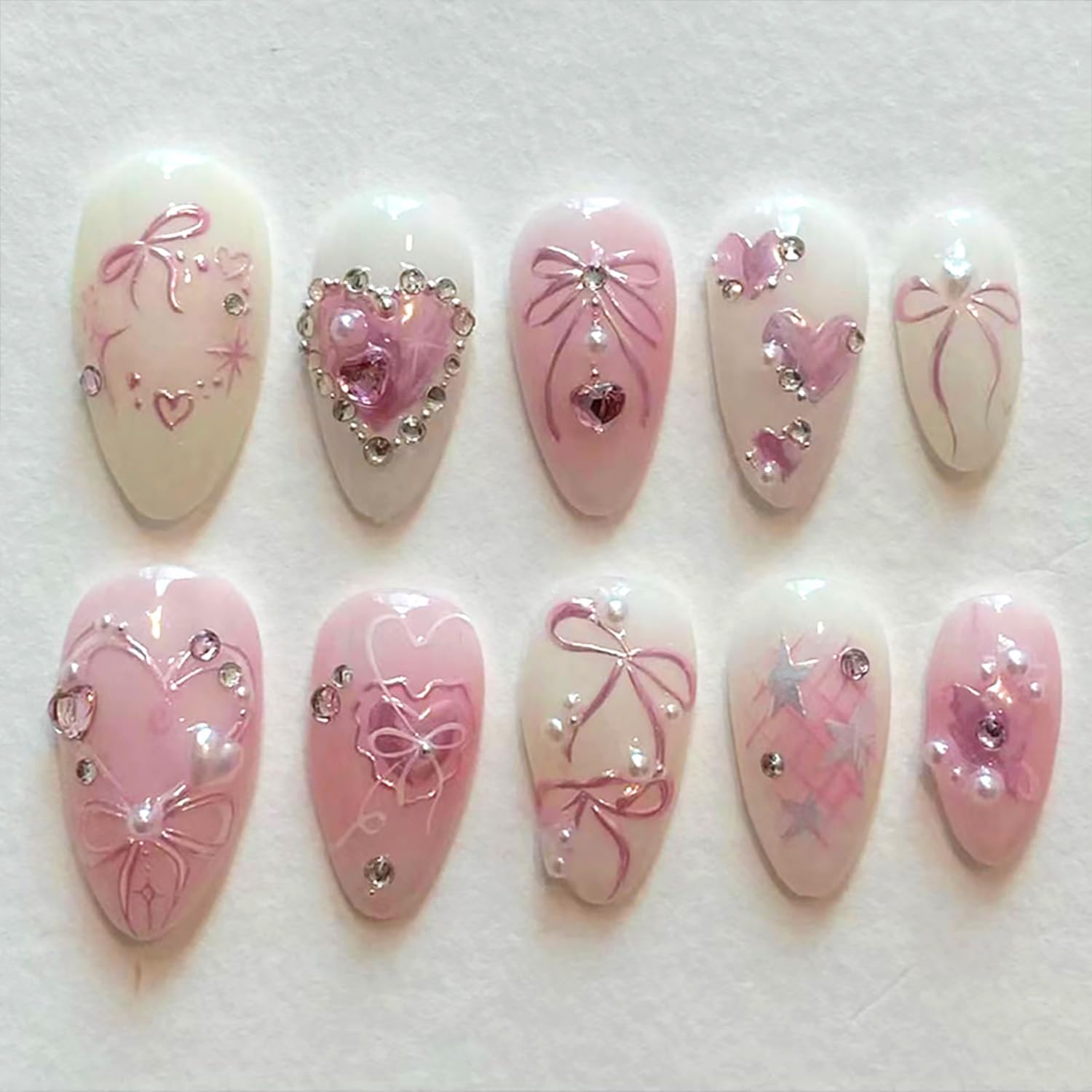 24Pcs Pink Bow Press on Nails Medium Almond Fake Nails with Silver Heart Rhinestones Design Glitter False Nails White Full Cover Artificial Glue on Nails Handmade Stick on Nails for Women Acrylic Nail